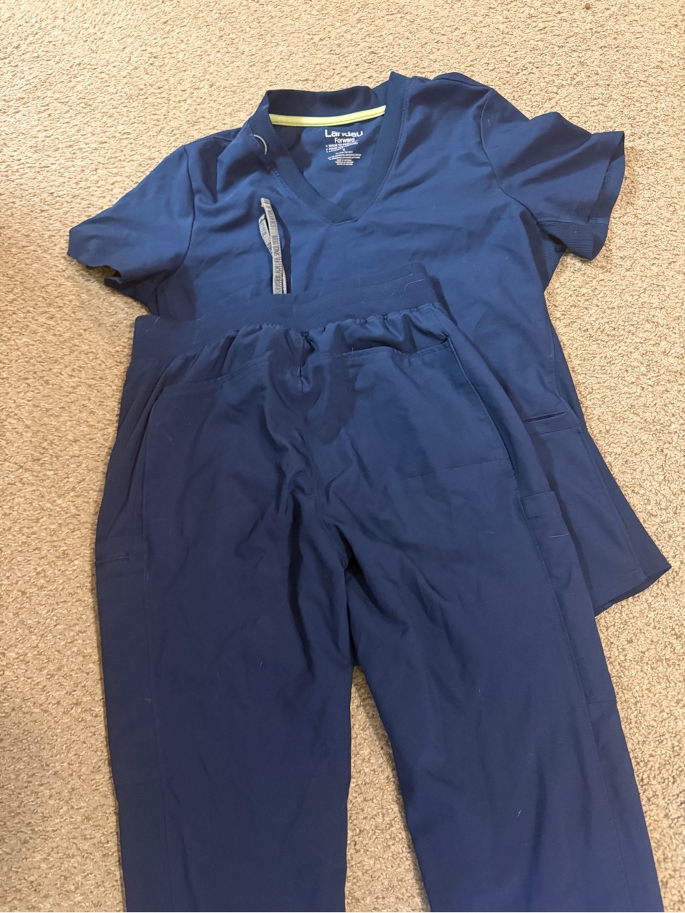 Navy blue women’s scrubs. Pants and top size small